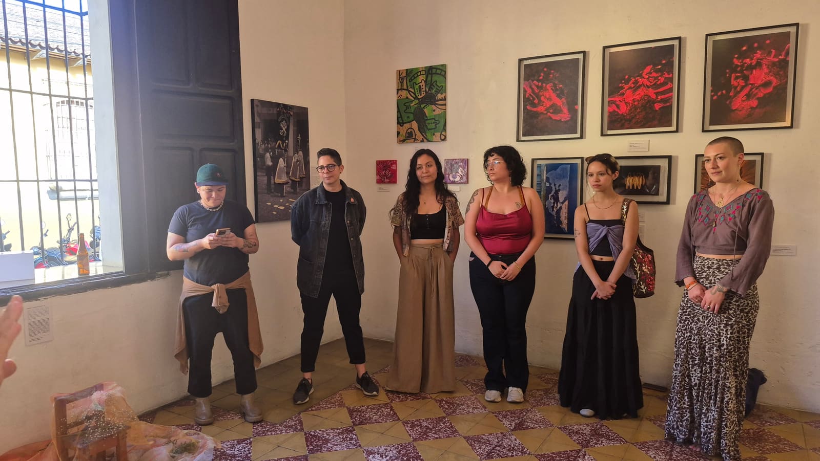 The artists of the group show The spectrum we inhabit, on opening day
